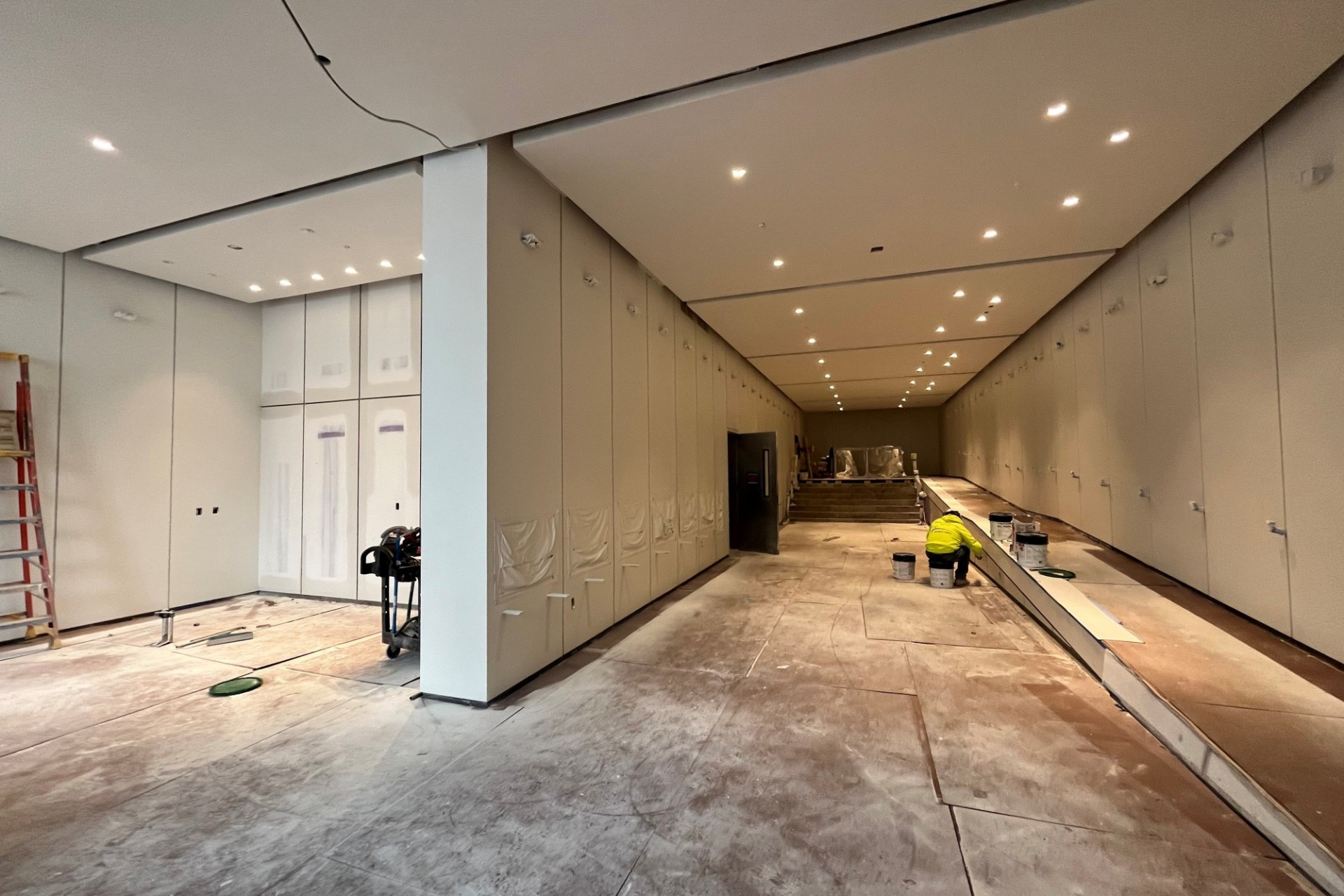 The lobby of 600 W. 125th Street under construction, with new ceiling and wall panels installed.