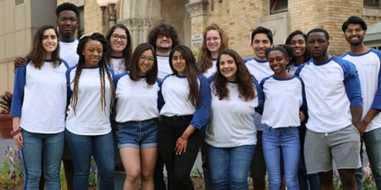 group of student in same blue and white shirt 