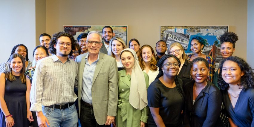 The summer 2019 SRP cohort with the deam, a group of college-aged men and women, with an older man in the center front.