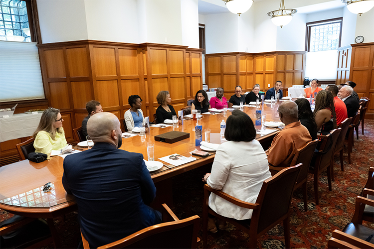 A roundtable of Columbia, community, and education leaders discuss the Double Discovery Center program model at a luncheon after the classroom visit. Photo by Diane Bondareff/Columbia University. A roundtable of Columbia, community, and education leaders discuss the Double Discovery Center program model at a luncheon after the classroom visit. Photo by Diane Bondareff/Columbia University.