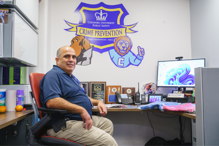 Ricardo Morales, Assistant Director of Crime Prevention at Columbia University’s Department of Public Safety in his office in Low Library. Morales has been at the university for 37 years and has been in charge of coordinating Public Safety’s participation in the school supply drive for the last seven years. Photo Credit: Henry Danner