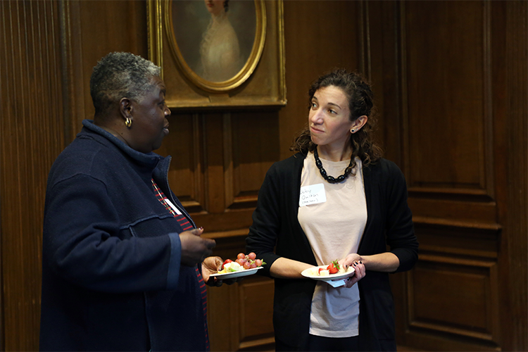 Abby Oulton, right, part of the 10th cohort of  A'Lelia Bundles Community Scholars at Columbia, speaks with Lil Nickleson, part of the cohort. Photo by Bruce Gilbert. 