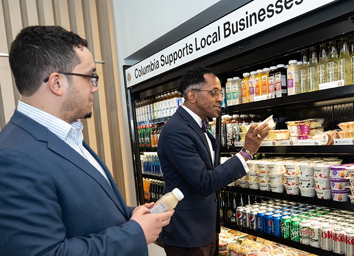 City Council Member Shaun Abreu and Assembly Member Al Taylor inspect the local vendors on display in the cafe on the ground floor of David Geffen Hall. Photo by Diane Bondareff. Council Member Shaun Abreu and Assembly Member Al Taylor inspect the local vendors on display in the Cafe on the ground floor of David Geffen Hall.