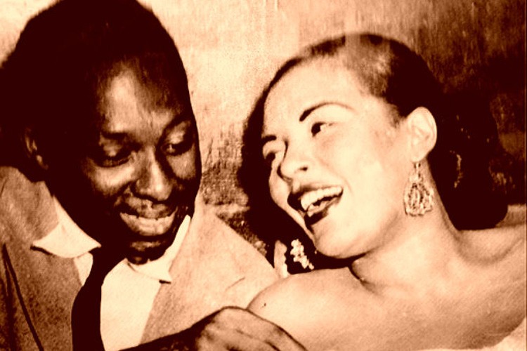 Gordon Anderson, house photographer for The Apollo, with singer Billie Holiday