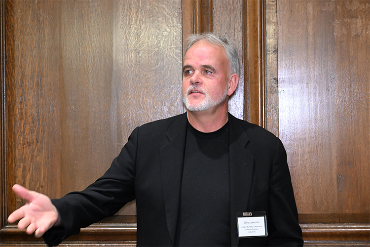 Chris Lawrence, a Bundles Scholar from the 11th cohort, introduces his project. Photo by Eileen Barroso. Chris Lawrence