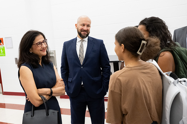 Columbia President Minouche Shafik and Columbia College Dean Josef Sorett speak with Double Discovery students.