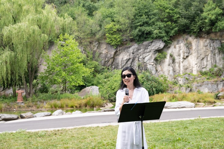Jeannette M. Wing, Executive Vice President for Research at Columbia University, spoke about the project launch at Morningside Park Pond. Photo credit: Diane Bondareff