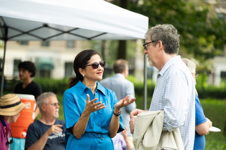 President Shafik speaking with Jeffrey Shaman.