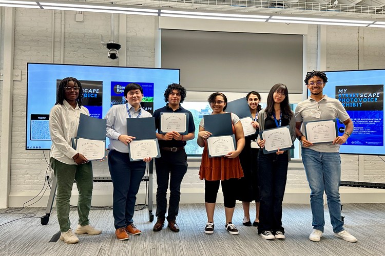 From left to right: Vania Senanu, Ezra Ju, Joel Lazcano, Eunice Yanes, Maryam Sultan, Susan (Susie) Cao, and Christopher Grullon during their final presentations. Photo credit: The Trust Collaboratory My Streetscape Summer School students with their diplomas.
