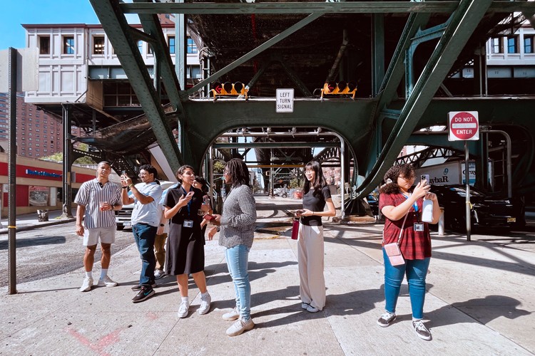 Students outside on 125th Street. 