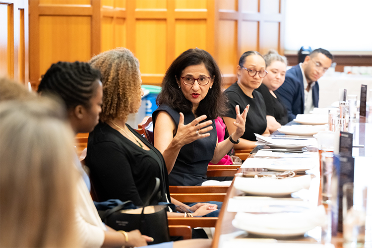 Columbia President Minouche Shafik speaks with Deputy Manhattan Borough President Keisha Sutton-James and a roundtable of community leaders. 