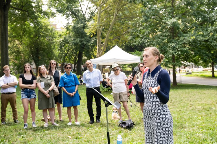 Suzanne Pratt speaking at Morningside Park Pond. 