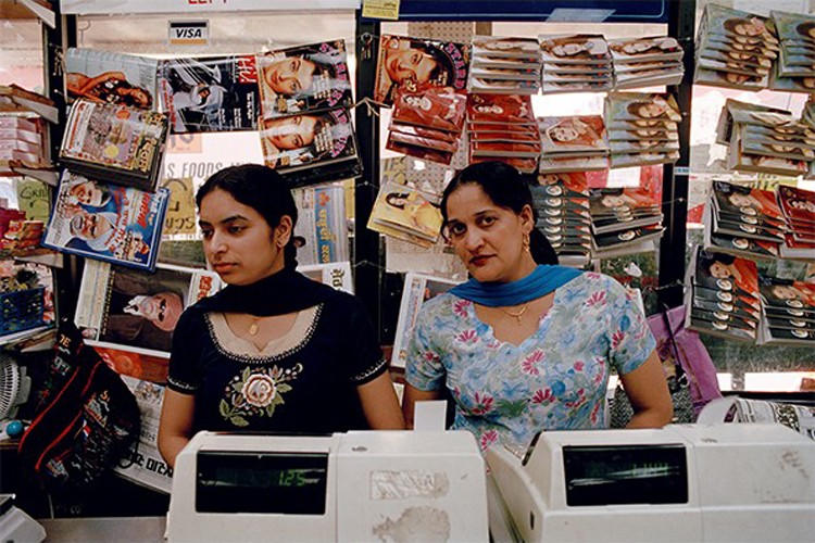 A photograph of two women at an Indian grocery store in Queens.