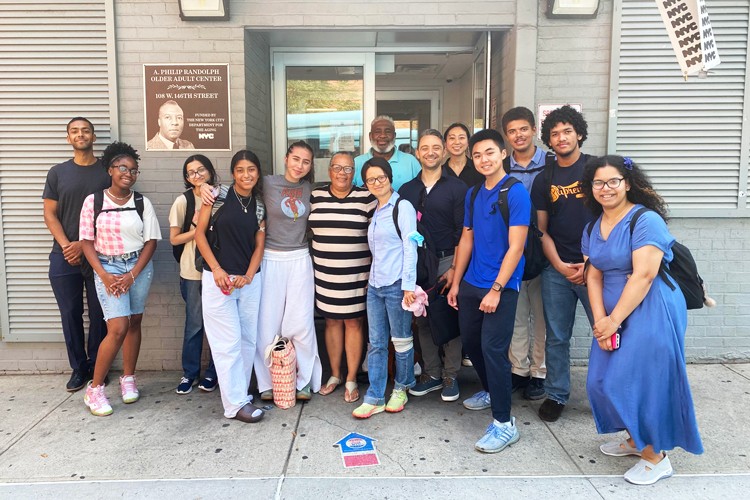High schoolers with the Center for Smart Streetscapes "My Streetscape Summer Research Institute" join Director of The Trust Collaboratory Cristian Capotescu, Columbia professor Dr. Sharon Di, and community partners at their visit to the ARC XVI A. Philip Randolph Senior Center. Photo credit: Center for Smart Streetscapes. Group of students with CS3 summer school.