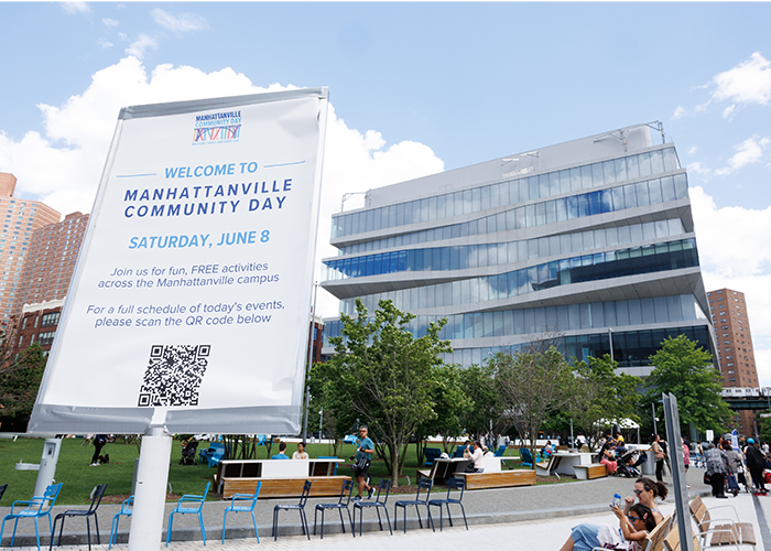 A city view of the Manhattanville campus during Community Day. Photo by Sirin Samman. the manhattanville community day sign in front of the square