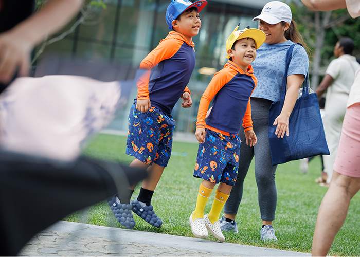 Young attendees jump and dance at Manhattanville Community Day. Photo by Sirin Samman. kids dance at community day.