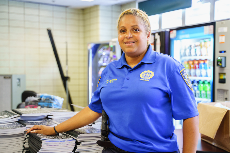 Detective Johanna Ureña of the 26th Precinct’s Community Affairs unit has been on the force for over 20 years. She oversees the school supply drive and the back-to school event where the supplies are distributed. Photo Credit: Henry Danner