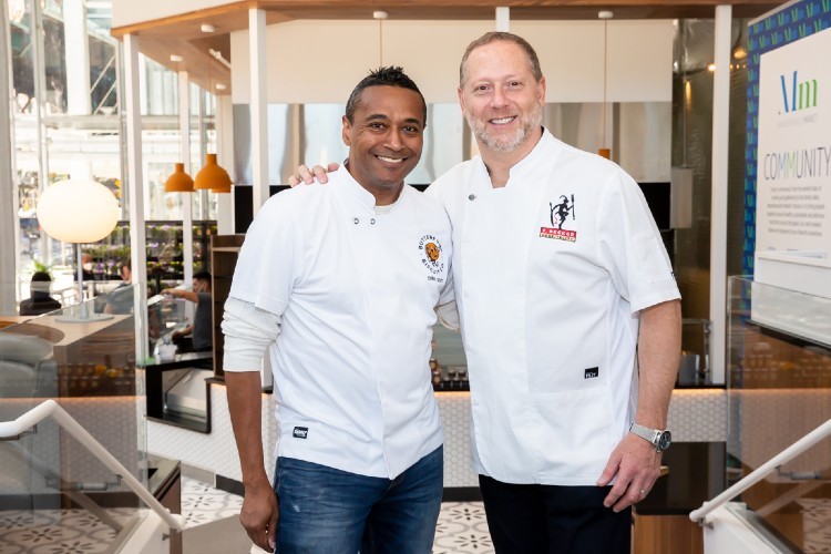 Chef Chris Scott (left) & Chef Franklin Becker (right) Photo of two men smiling