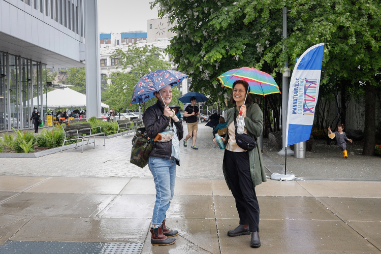 Attendees braved the rain to celebrate Uptown community and culture. Photo credit: April Renae