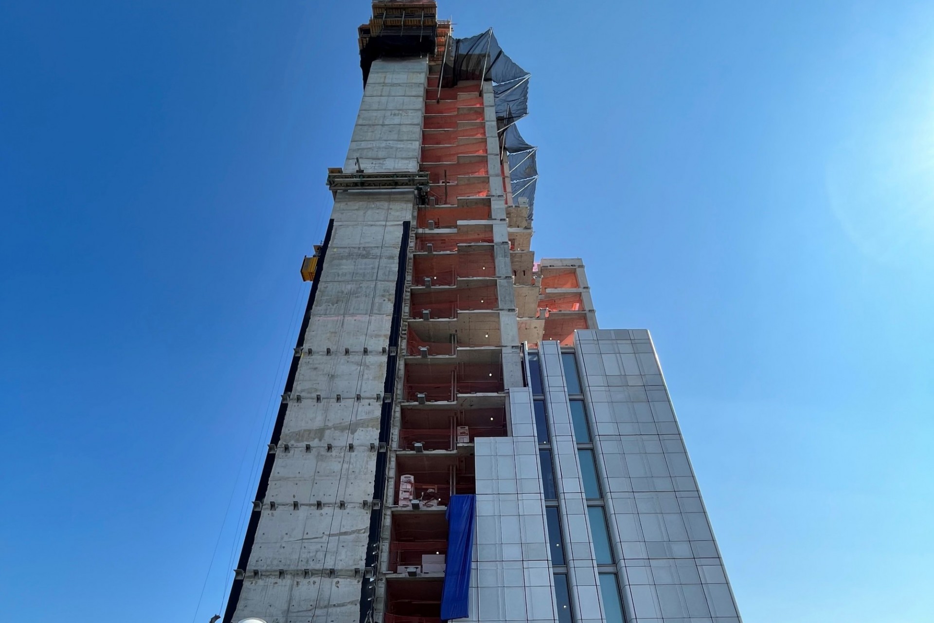 600 W. 125th Street, looking north A view of the 600 W. 125th Street construction site which is 33 floors high, and has some facade panels installed around it.