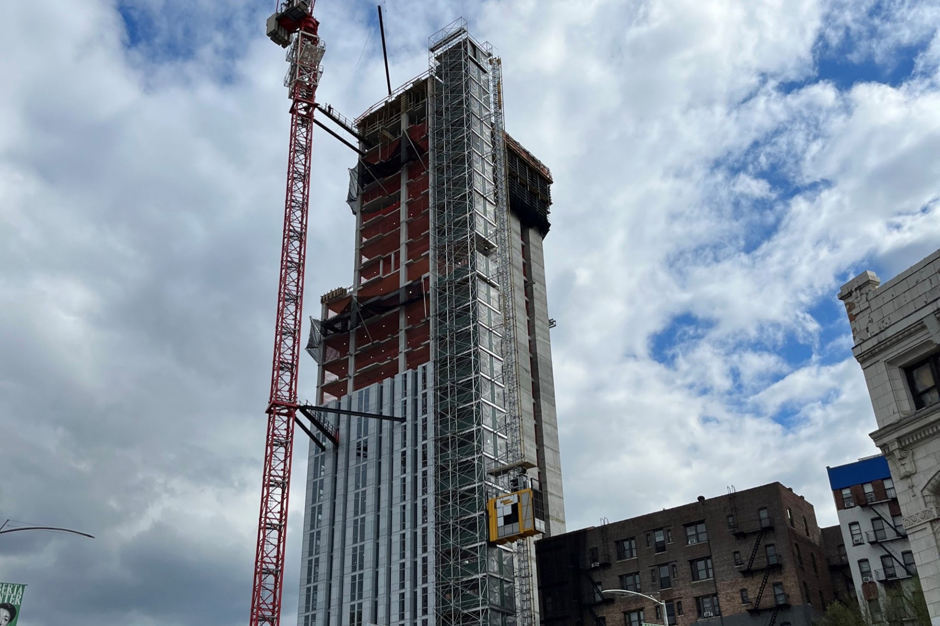 A view of the 600 W. 125th Street construction site which is 29 floors high, and has some facade panels installed around it. 