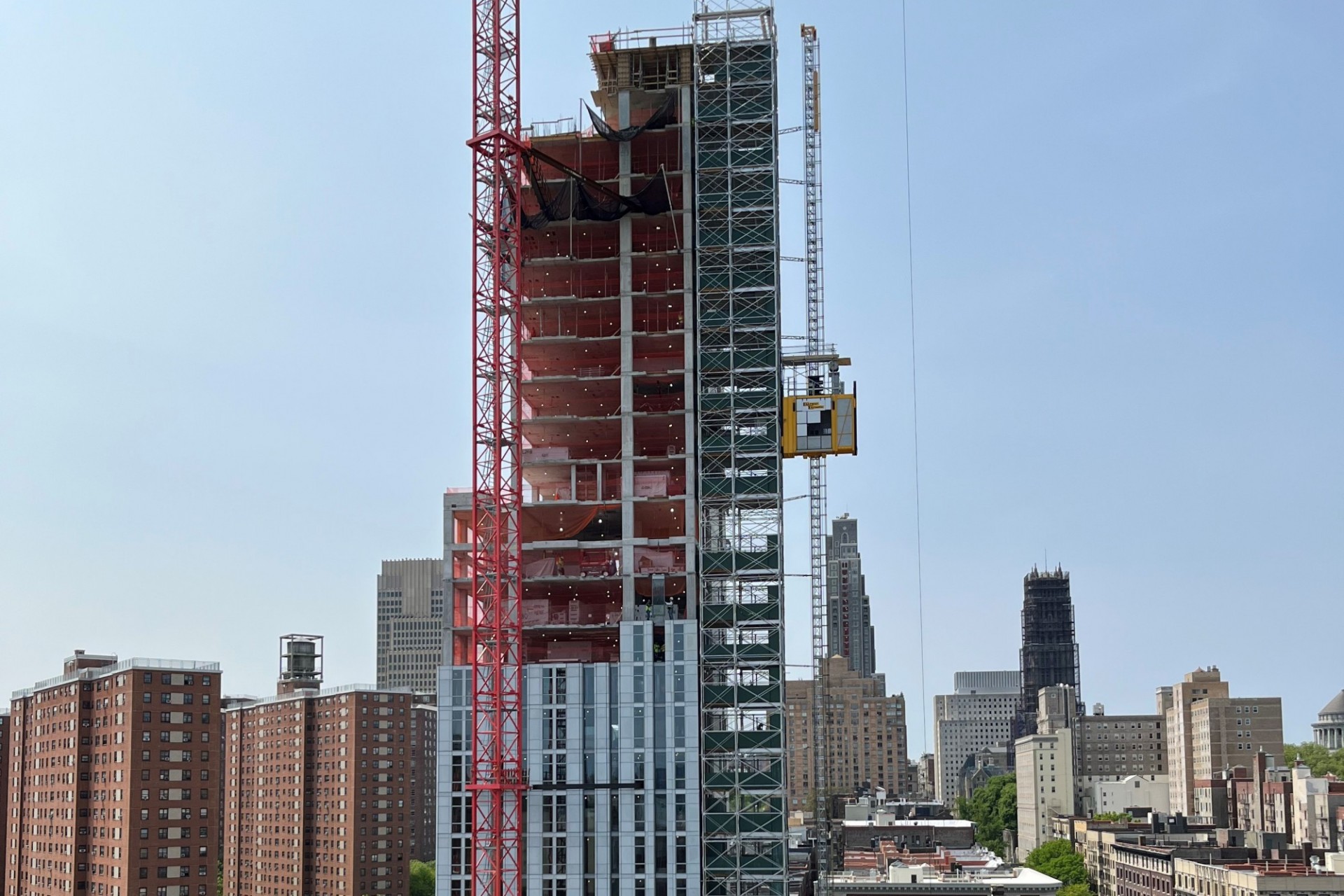 A view of the 600 W. 125th Street construction site which is 29 floors high, and has some facade panels installed around it. 