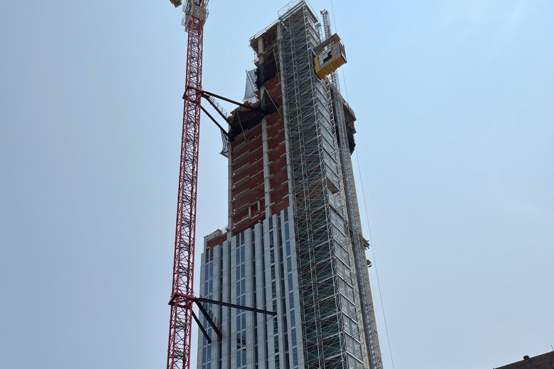 A view of the 600 W. 125th Street construction site which is 34 floors high, and has some facade panels installed around it. 
