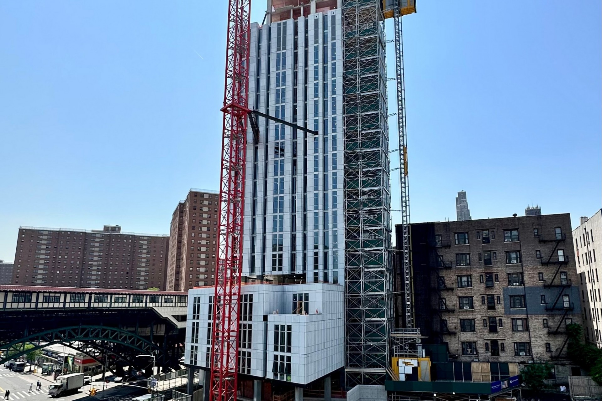 A view of the 600 W. 125th Street construction site which is 34 floors high, and has some facade panels installed around it. 
