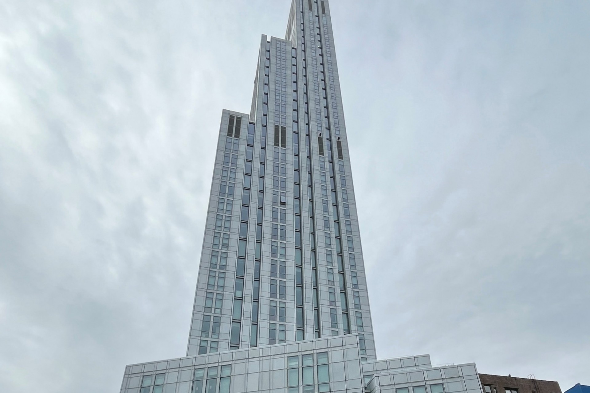 A view of the upper floors of 600 W. 125th Street on a cloudy day.