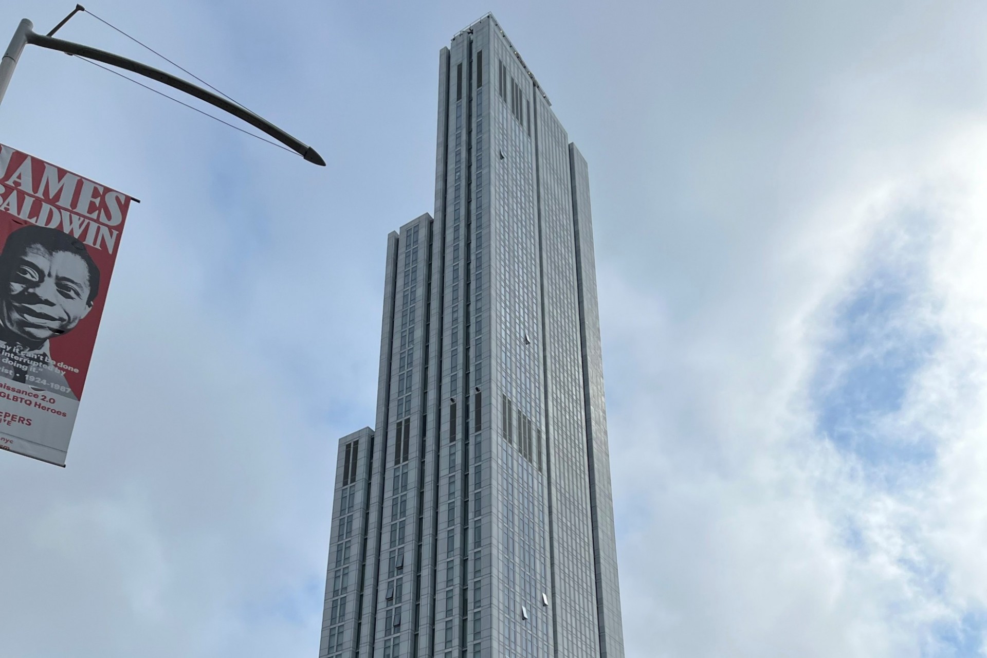 A view of the upper floors of 600 W. 125th Street on a cloudy day. 