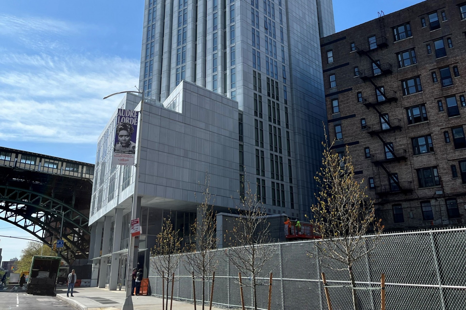 A view of the lower floors of 600 W. 125th Street with the elevated 1 train in the background. 