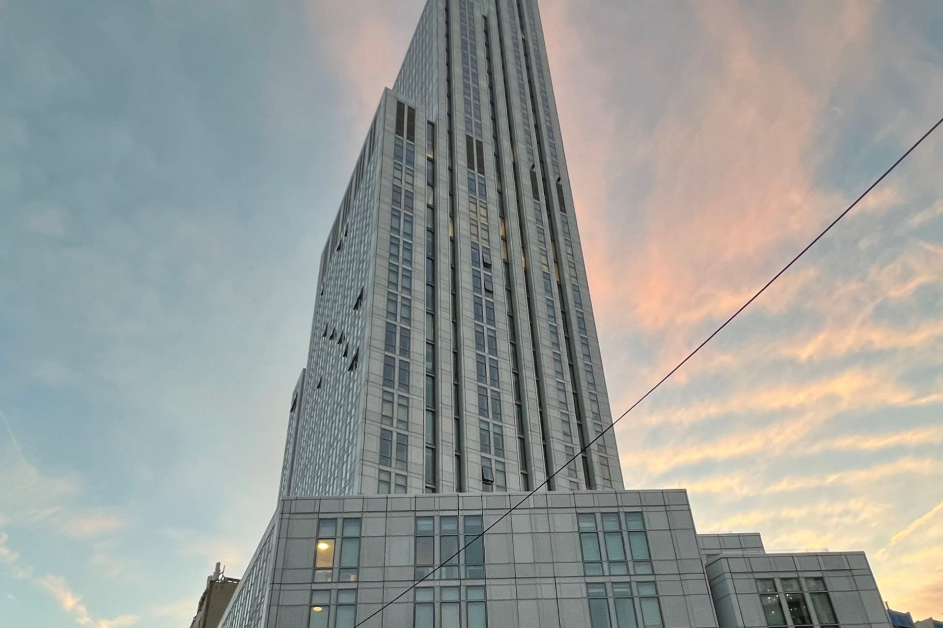 A view of the upper floors of 600 W. 125th Street during sunset.