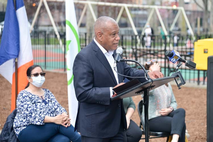 man speaking at podium