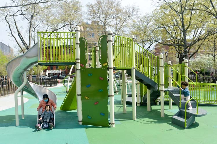 Man and child on slide