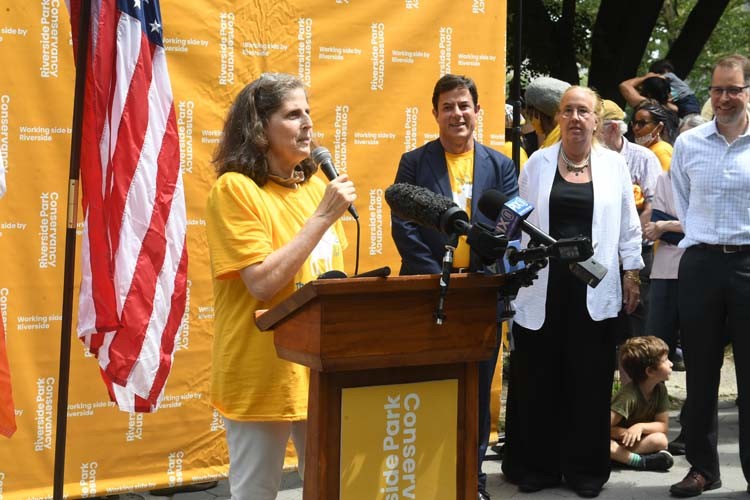 Photo Credit: Eileen Barroso Person speaking at podium