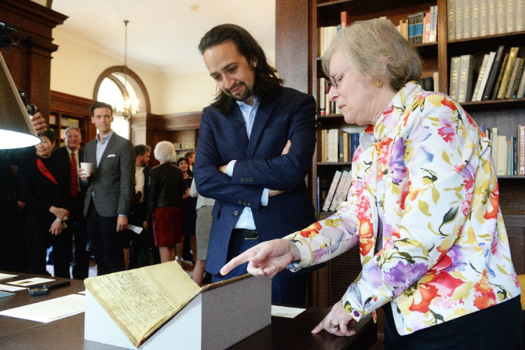 Lin-Manuel Miranda viewed a selection of Alexander Hamilton’s papers and personal artifacts with Jennifer B. Lee, curator for performing arts, acting as his guide. Photo by Eileen Barroso.