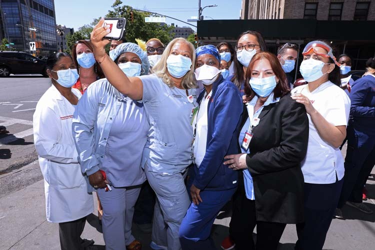 group of medical professionals standing for a photo