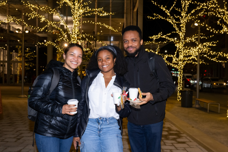 Attendees mixed and mingled over cups of hot cocoa at the Lights on the Plaza celebration. Photo credit: Diane Bondareff Attendees mixed and mingled over cups of hot cocoa at the Lights on the Plaza celebration. Photo credit: Diane Bondareff