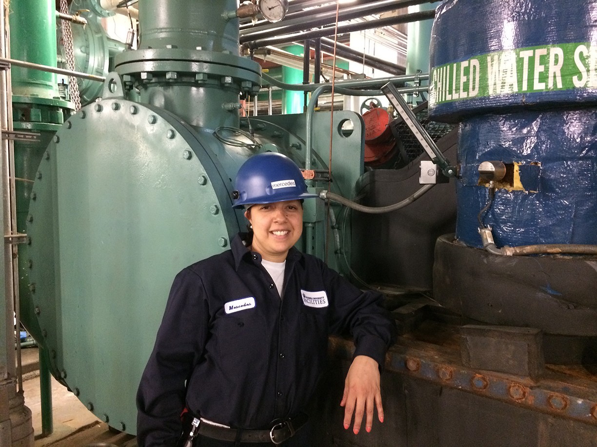 Mercedes Santana, mechanic trainee, at the chiller plant on Columbia’s Morningside campus.