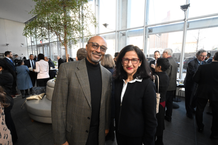 Community Board 9 Vice Chair Victor Edwards and Minouche Shafik at the Manhattanville Market breakfast reception. Photo credit: Eileen Barroso