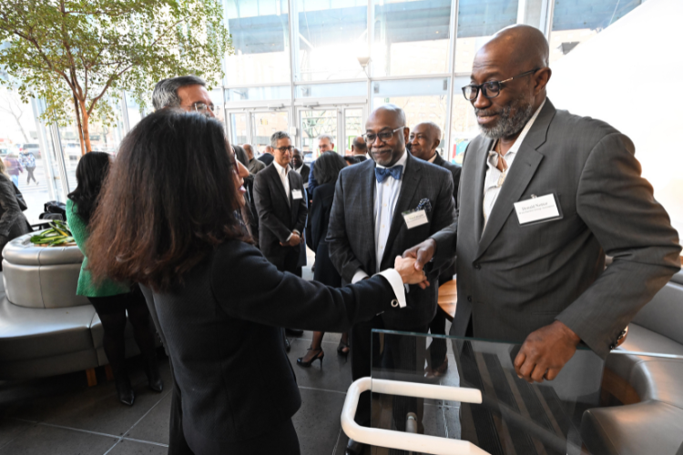 Shafik connects with Donald Notice, Executive Director, West Harlem Local Development Corporation, and Hamil Douglas, President & CEO, Harlem Commonwealth Council, at the Manhattanville Market breakfast reception. Photo credit: Eileen Barroso Shafik connects with Donald Notice, Executive Director, West Harlem Local Development Corporation, and Hamil Douglas, President & CEO, Harlem Commonwealth Council, at the Manhattanville Market breakfast reception. Photo credit: Eileen Barroso