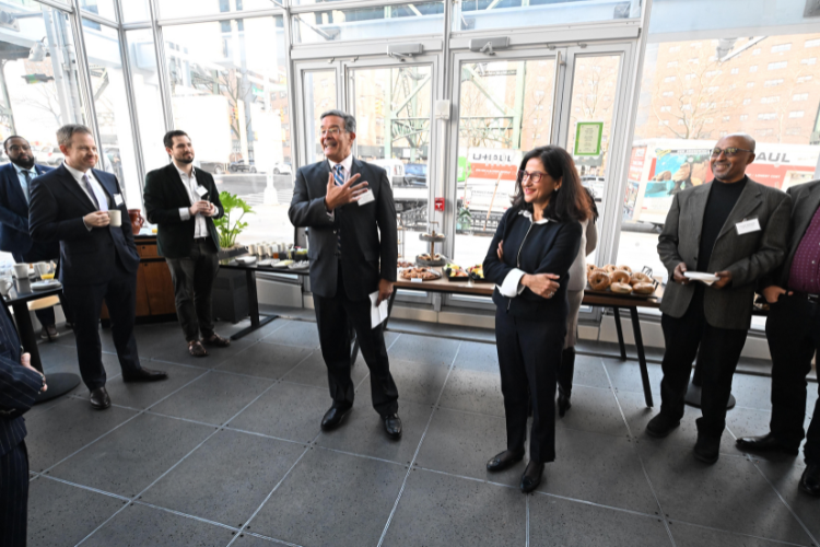  Presiding Justice Rolando T. Acosta delivers remarks at the Manhattanville Market breakfast reception. Photo credit: Eileen Barroso