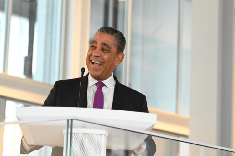 U.S. Representative Adriano Espaillat addresses the crowd of esteemed local leaders at the Annual Friends and Neighbors Breakfast. Image by Eileen Barroso.