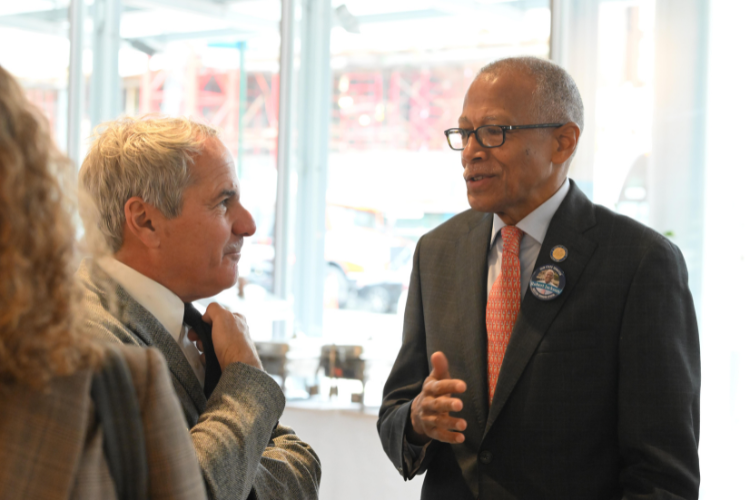 George Calderaro, Director of Community Relations at Columbia University's School of Professional Studies and Senator Robert Jackson. Image by Eileen Barroso.