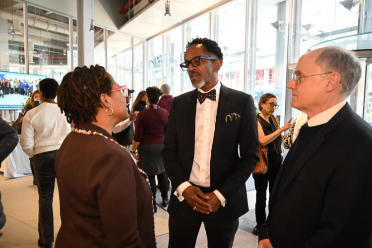 Assemblyman Al Taylor connected with attendees at the annual Friends and Neighbors Breakfast. Image by Eileen Barroso.