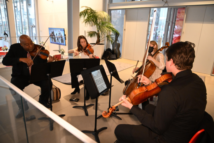 The Harlem Chamber Players provided melodic tunes throughout the morning during Columbia's annual Friends and Neighbors Breakfast. Image by Eileen Barroso. The Harlem Chamber Players provided melodic tunes throughout the morning at Columbia's annual Friends and Neighbors Breakfast. Image by Eileen Barroso.