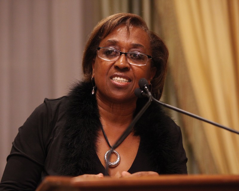 Sonia Reese speaking at 2014 Community Impact Gala Sonia Reese speaking at community impact gala at podium