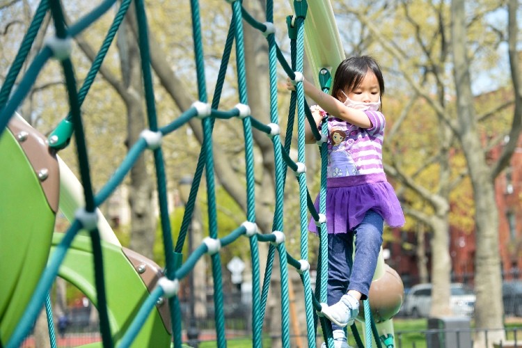 Girl on Jungle Gym