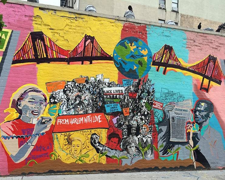 Mural commemorating two local Harlem activists, Malcolm X and Yuri Kochiyama, with a group of protesters holding signs including "Black Lives Matter"