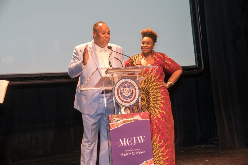 Photo Credit: Lynn Saville Speakers at podium